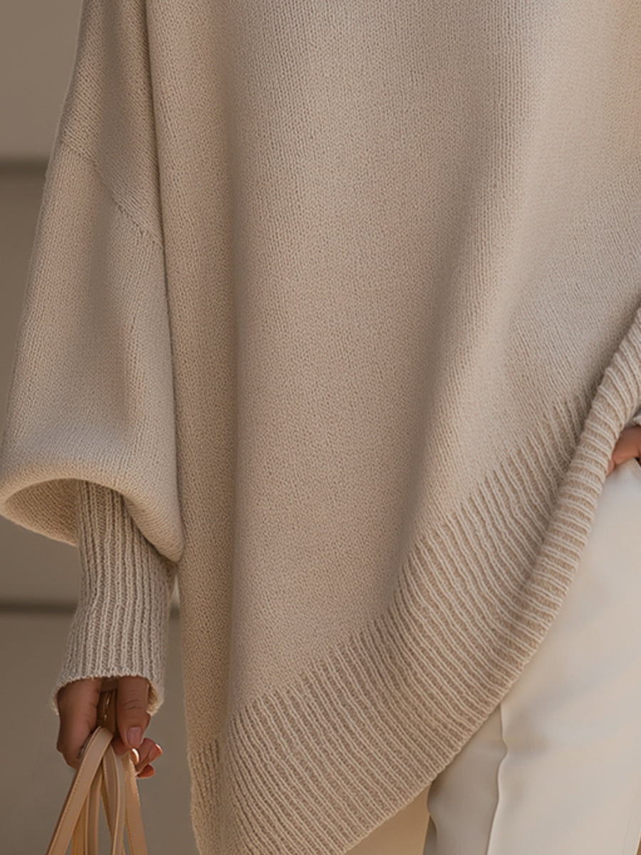Beige knit jumper hem and sleeve cuff with ribbed trim, drop-shoulder style
