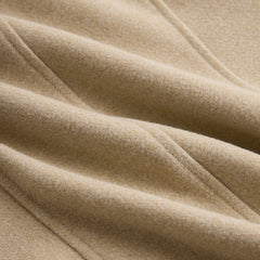 Khaki wool-blend fabric closeup with fine textured weave