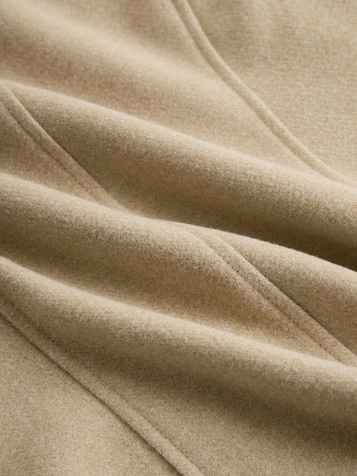 Khaki wool-blend fabric closeup with fine textured weave