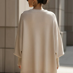 Beige drop-shoulder knit jumper back view with ribbed crew neck and hem