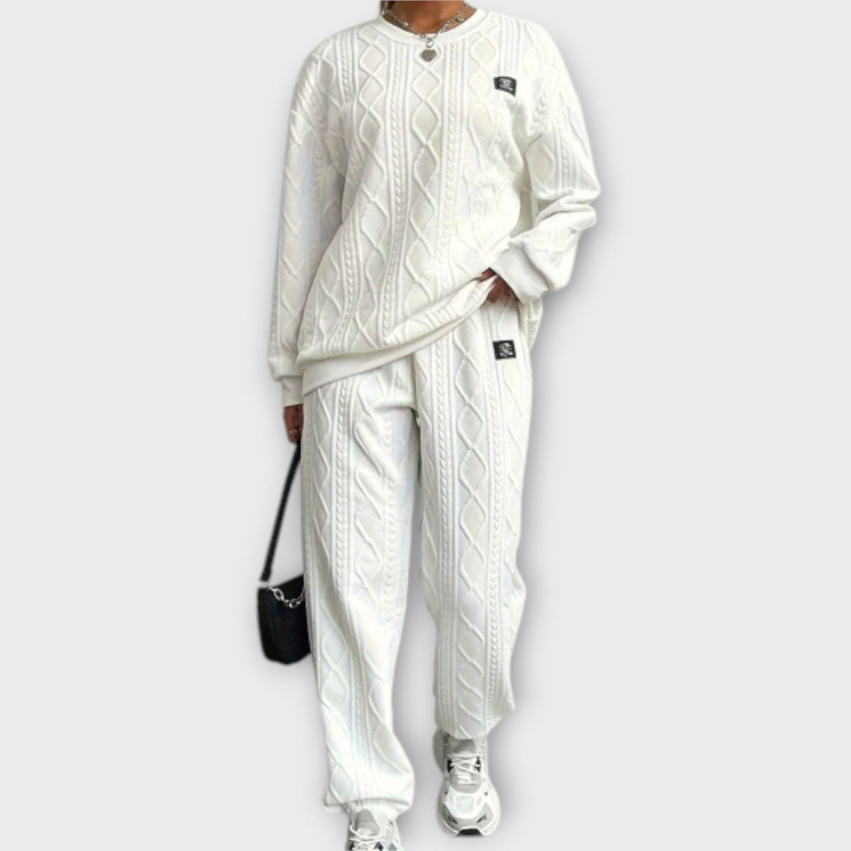 White cable-knit casual set: round-neck long-sleeve top and matching jogger pants