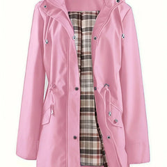 Women’s 3-in-1 jacket in pink, hooded outer layer with plaid inner lining and pockets.