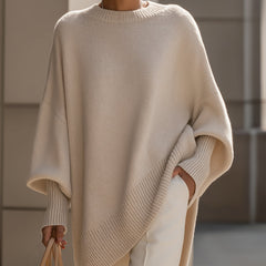 Beige drop-shoulder knit jumper with ribbed crew neck and asymmetrical hem