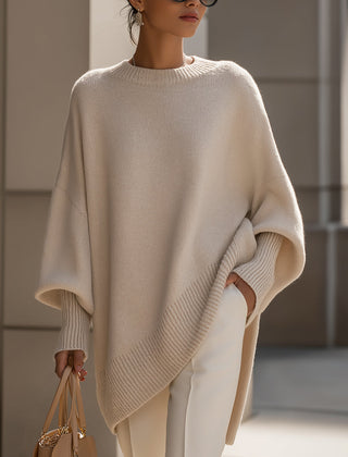 Beige drop-shoulder knit jumper with ribbed crew neck and asymmetrical hem