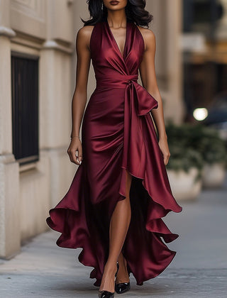 Burgundy satin wrap maxi dress with V-neck and draped waist tie, layered ruffle hem