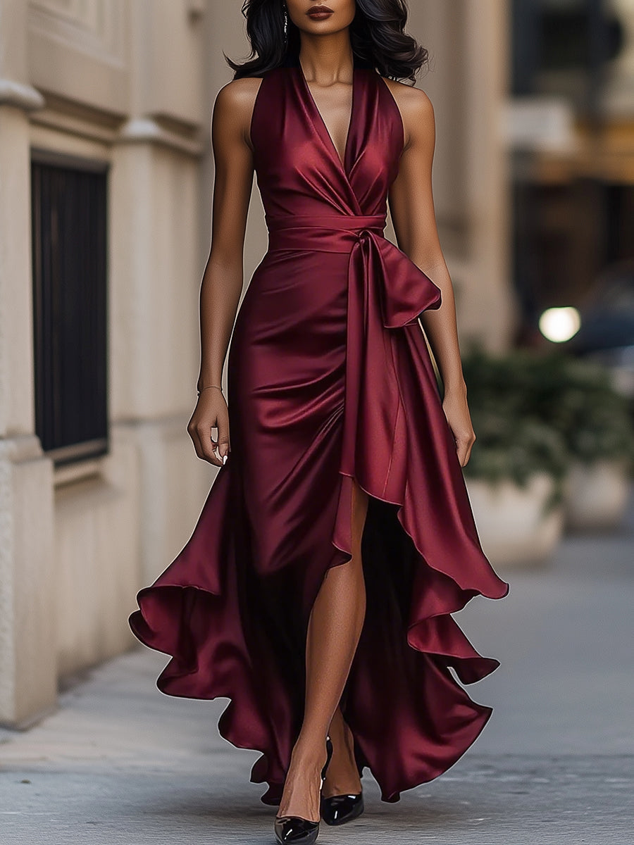 Burgundy satin wrap maxi dress with V-neck and draped waist tie, layered ruffle hem