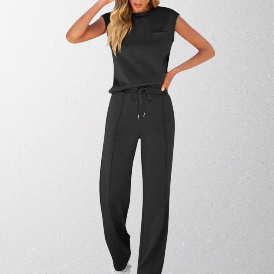 Black sleeveless lounge co-ord set with pocket top and drawstring wide-leg pants