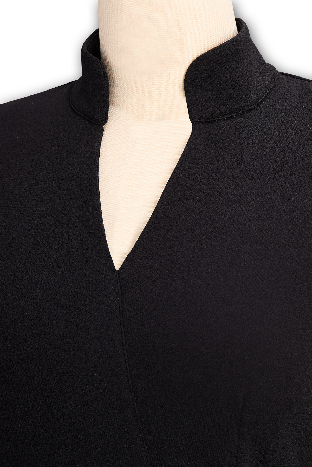 Black midi dress with V-shaped neckline and structured shoulder seam