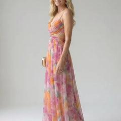 Multicolor sleeveless maxi wrap dress with V-neck and flowing tiered skirt, side view.
