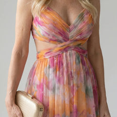 Multicolor V-neck wrap maxi dress with twisted waist and pleated sheer skirt detail.