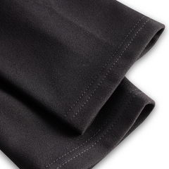 Black midi dress fabric with visible side seam stitching detail