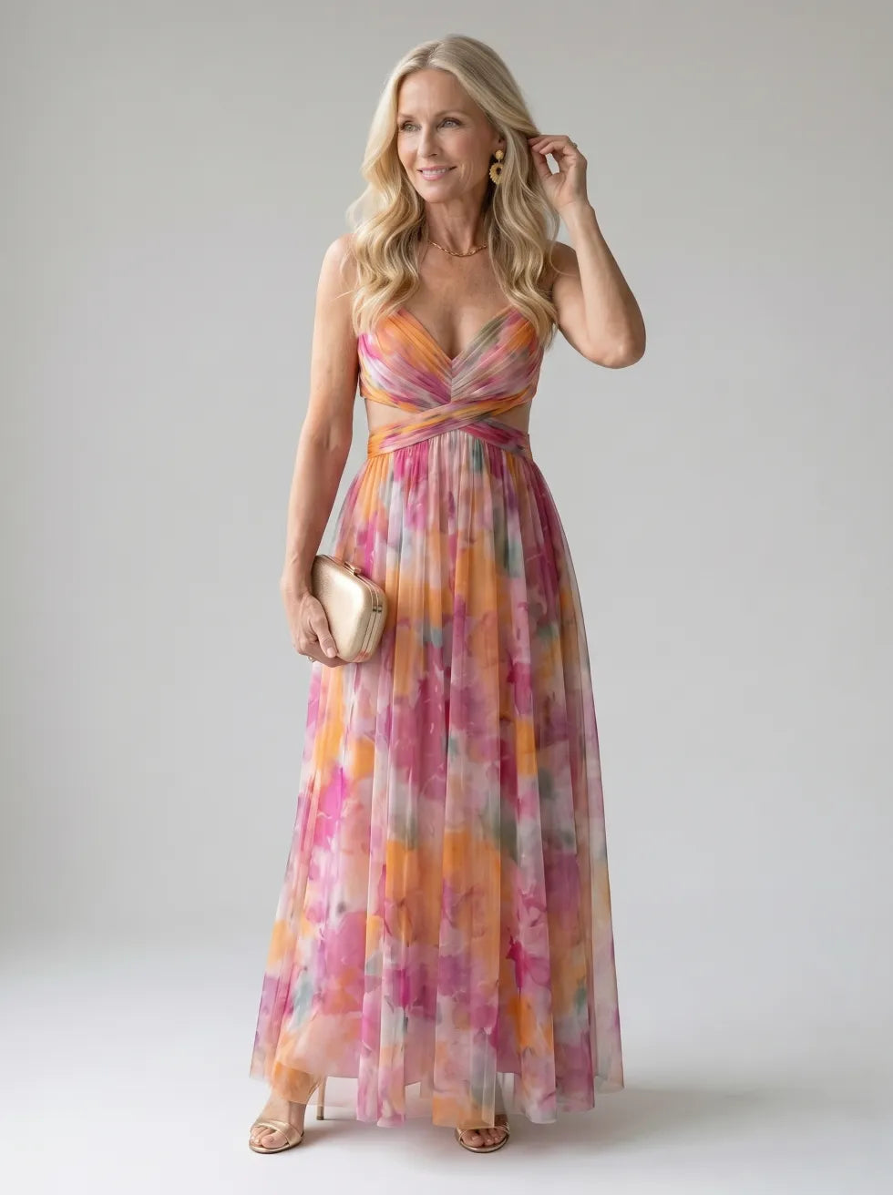 Multicolor maxi wrap dress with V-neck, sleeveless bodice, and twisted waist detail.