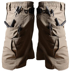 Light tan outdoor tactical shorts with elastic waistband, cargo pockets, and tool strap loops