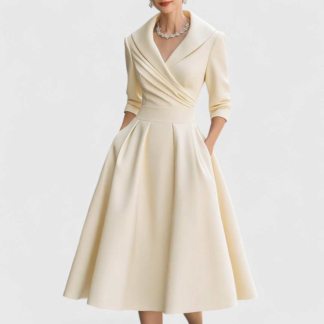 Beige midi dress with surplice V-neck, three-quarter sleeves, and pleated full skirt