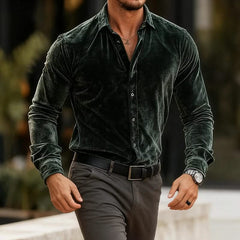 Green velvet button-up shirt, long sleeves, front button placket.