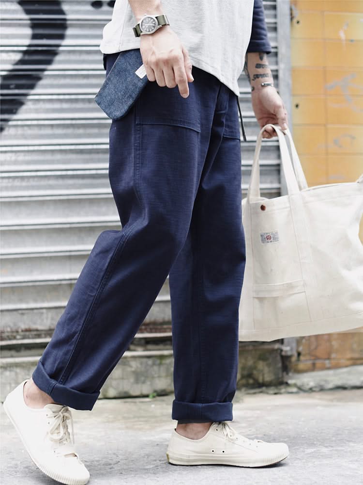 Navy straight fatigue pants with relaxed straight leg and side pockets