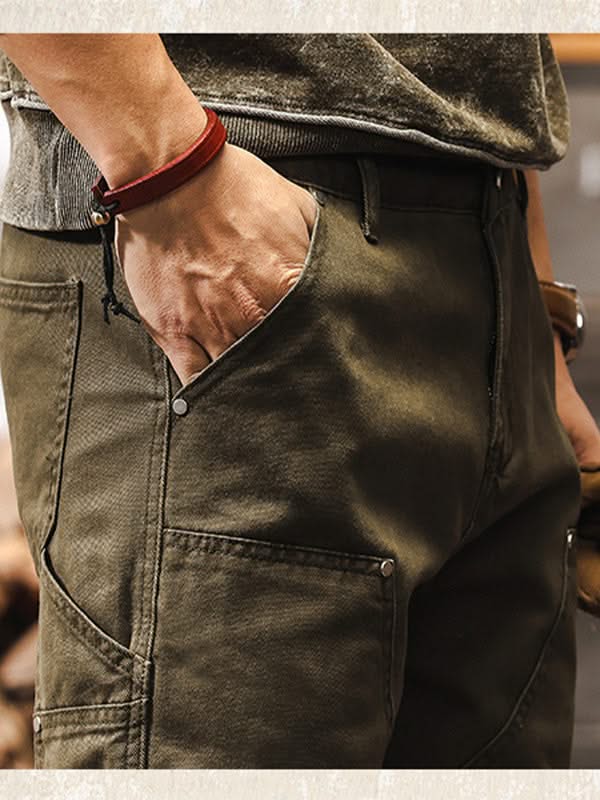 Army green utility pants close-up of right front pocket and belt loop