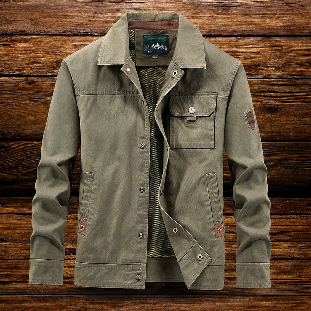 Green utility jacket with button front, flap pockets, and diagonal inner lining