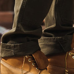 Army green straight-leg utility work pants with cuffed hem and side pockets
