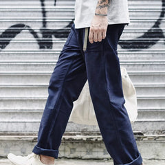 Straight fatigue pants in navy blue with cargo pockets and wide cuffed straight legs