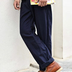 Navy straight fatigue pants with button-fly and side pockets