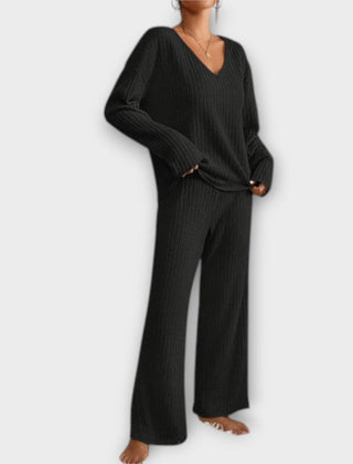 Black ribbed knit two-piece set, V-neck long-sleeve top and wide-leg pants