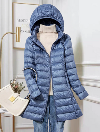 Blue hooded ultralight puffer down jacket with full-length zip and angled hem.