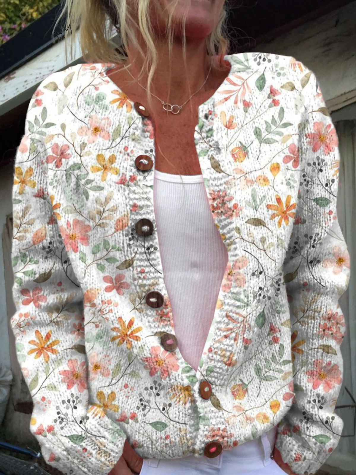 Women’s vintage knit cardigan sweater with multicolor floral print, button front