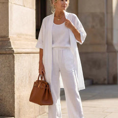 3-piece set in white with long tunic over tank top and wide-leg pants.