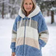 Plush colorblock jacket in blue, cream, and gray with zip front and hood