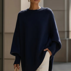 Brown drop-shoulder knit jumper with ribbed crew neck and draped asymmetrical hem