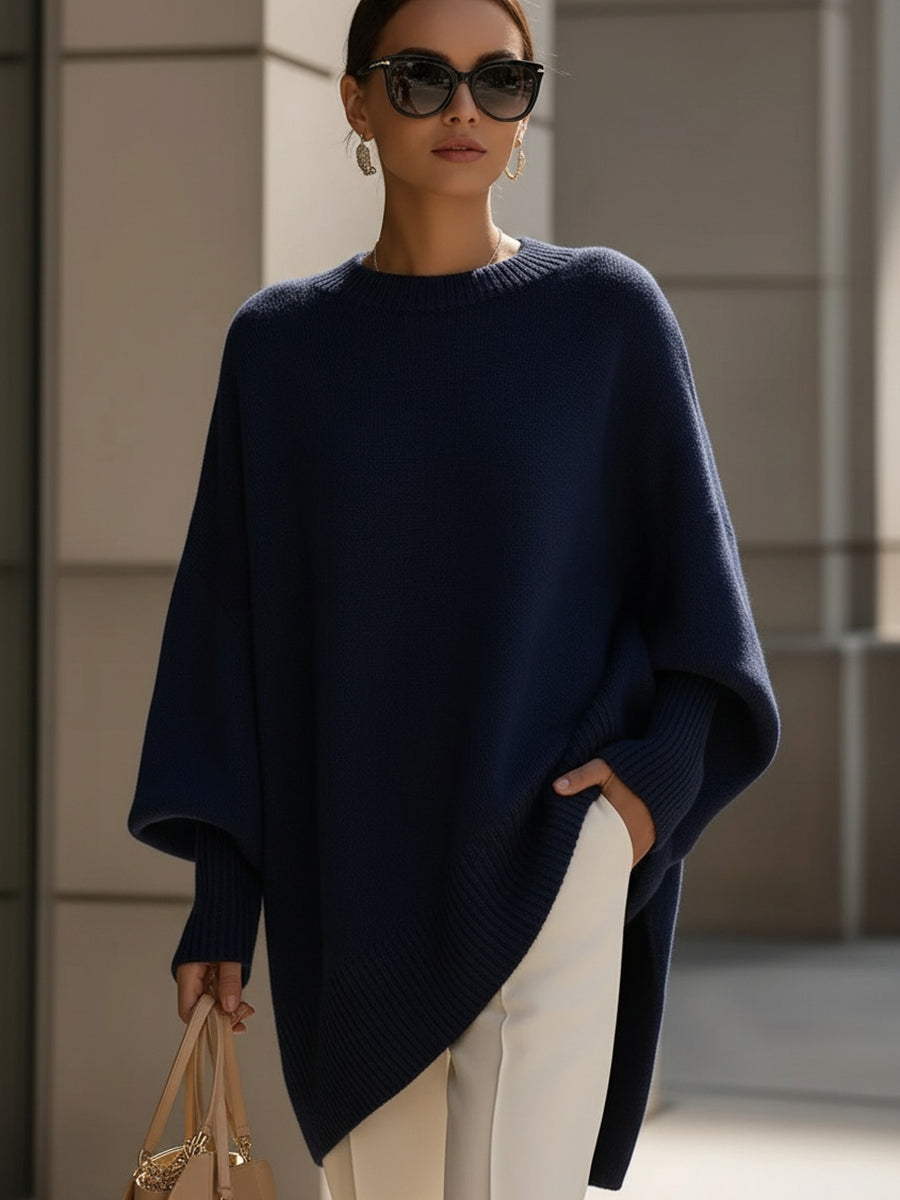 Brown drop-shoulder knit jumper with ribbed crew neck and draped asymmetrical hem