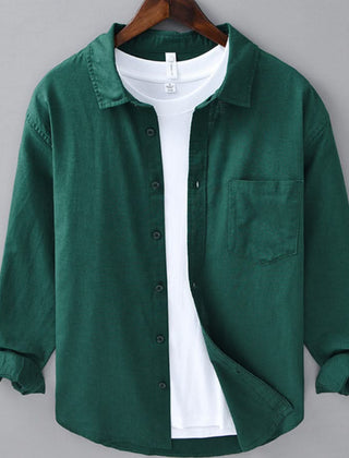 Green linen button-up shirt with point collar, chest pocket, and dark button placket