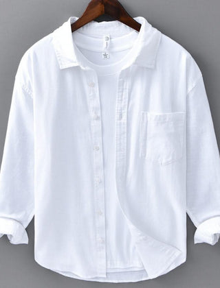 White linen button-up shirt with point collar, chest pocket, and button placket