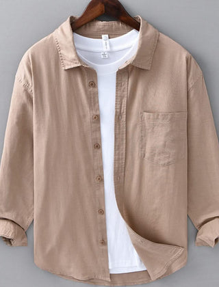 Camel linen button-up shirt with point collar, chest pocket, and white buttons