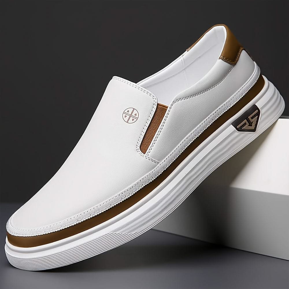 White slip-on shoes with brown trim, side gore panels, low profile rubber sole