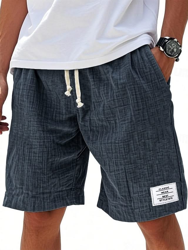 Everyday shorts in dark navy linen-look fabric with drawstring and side slant pockets