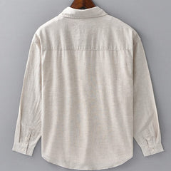 Back view of beige linen button-up shirt with collar and long sleeves