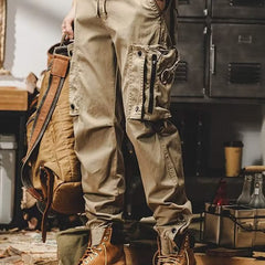Khaki utility trousers with cargo pockets, drawstring waist, and button-flap details