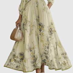 Cream and green floral pleated maxi dress with long sleeves, V-neck and smocked waist