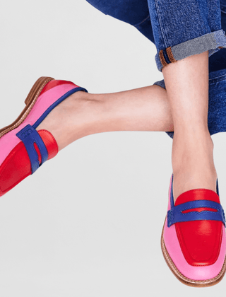 Pink loafers with blue strap and red toe panel, tan sole