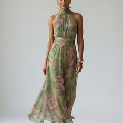 Floral gathered halter midi dress, green with pink flowers; high neck and cinched waist.