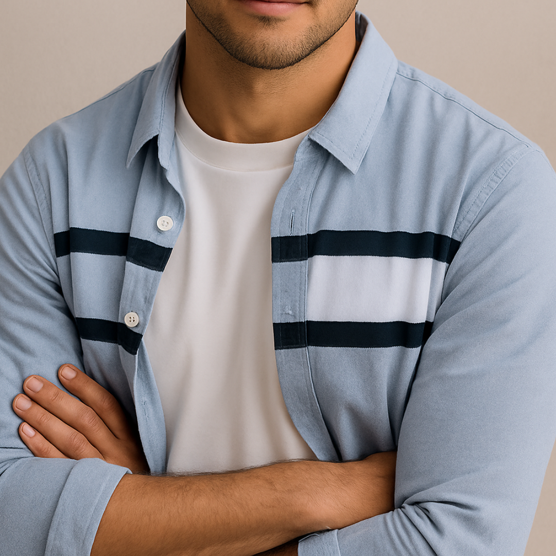 Light blue panel button-up shirt with dark stripe bands across chest, long sleeves