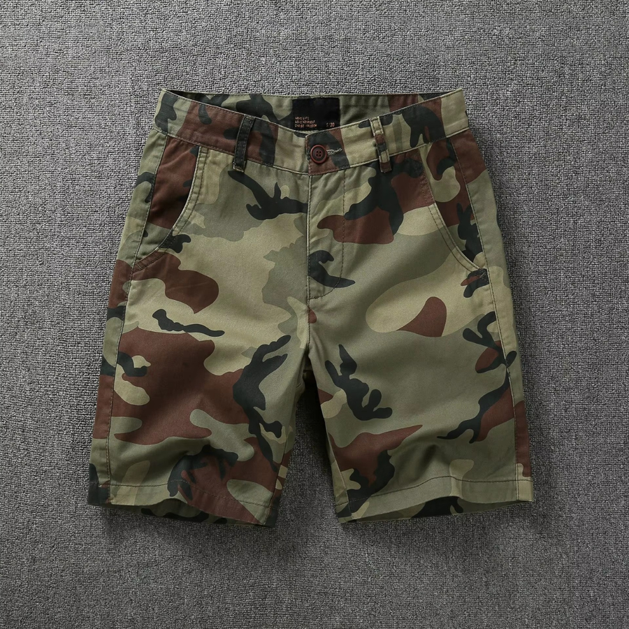 Camouflage tactical flex shorts, front view, belt loops and button fly with side pockets