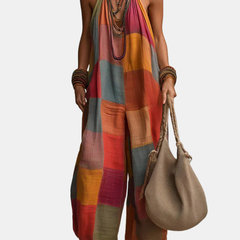 Warm multicolor patchwork sleeveless wide-leg jumpsuit with halter neckline