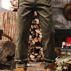 Army green straight-leg utility pants with multiple front pockets and belt loops