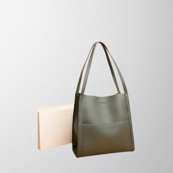 Green vegan leather tote bag with two top handles and minimalist front panel