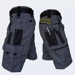 Charcoal grey outdoor tactical shorts with cargo pockets and tan panel utility pouch