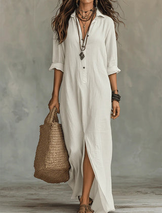 White button-front maxi dress with V-neck, three-quarter sleeves, and side slit