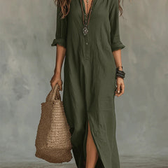 Green button-front maxi dress with V-neck, three-quarter sleeves, and side slit hem